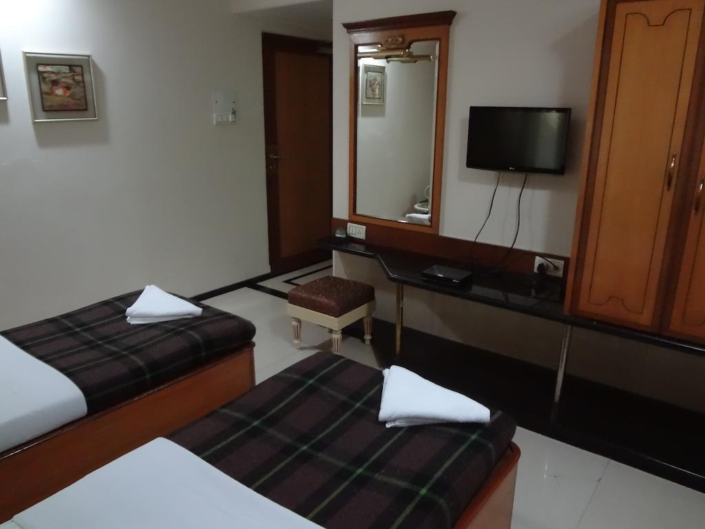 Hotel Ashwin Bombaim Quarto foto